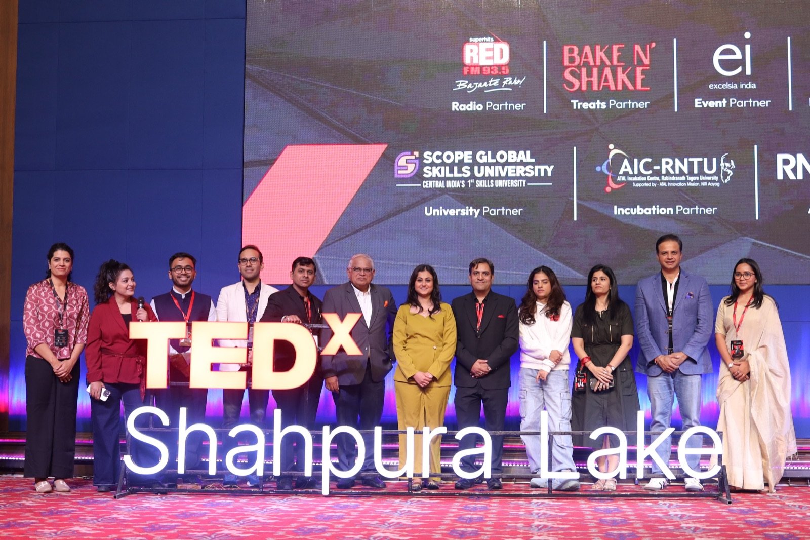 TEDxShahpura Lake team on stage